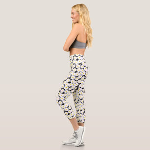 Negative Space Daisies white yellow on black Capri Leggings