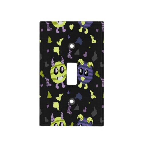 Neon blue and green monsters on black  light switch cover