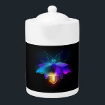 Neon Firefly on black Teapot<br><div class="desc">Antique,  mechanical firefly with light bulb and thin wings glows orange,  purple,  turquoise on black background. Steampunk style.</div>