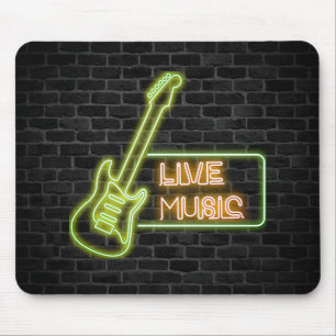 Neon guitar sign on brick mouse pad