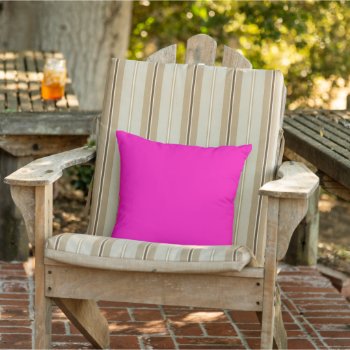 Neon Hot Pink Solid Color Outdoor Pillow by SimplyBoutiques at Zazzle