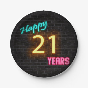 Neon number 21 sign on brick wall paper plates
