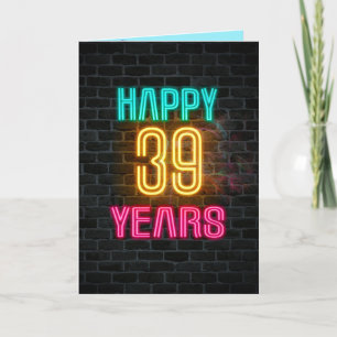 Neon sign on brick for 39th birthday card
