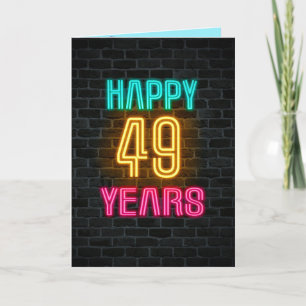 Neon sign on brick for 49th birthday card