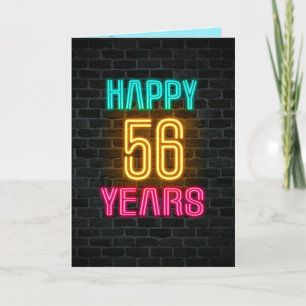 Neon sign on brick for 56th birthday card
