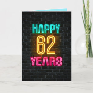 Neon sign on brick for 62nd birthday card