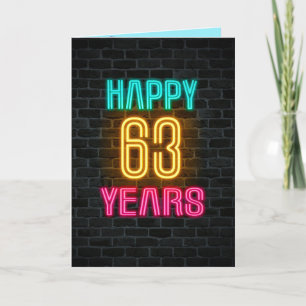 Neon sign on brick for 63rd birthday card