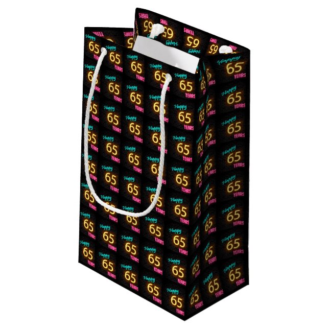 Neon sign on brick for 65th birthday small gift bag (Back Angled)