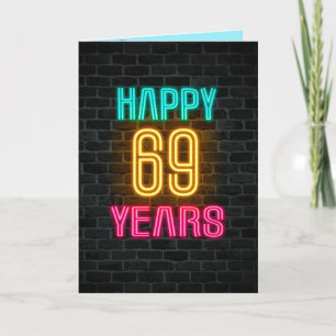 Neon sign on brick for 69th birthday card
