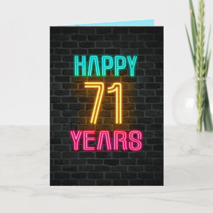 Neon sign on brick for 71st birthday card