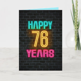Neon sign on brick for 76th birthday card