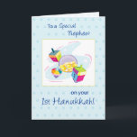 Nephew First Hanukkah Holiday Card<br><div class="desc">A wonderful card with colorful toys and gold coins for a wonderful baby boy. Wish a very happy First Hanukkah to your Nephew with this cute illustration about this Jewish holiday.</div>