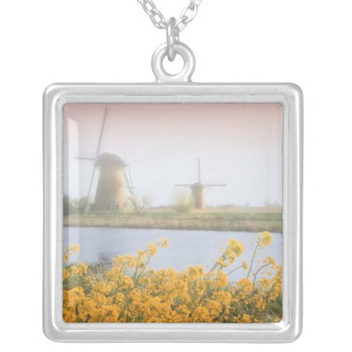 Netherlands Kinderdijk Windmills next to 2 Silver Plated Necklace