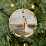 Neutral Floral Gold Frame First Christmas Photo Ceramic Ornament<br><div class="desc">Our first Christmas as Mr. & Mrs. with beautiful neutral champagne beige floral and round golden frame,  photo Christmas ornament. Back of ornament features matching floral arrangement on emerald green color background.</div>