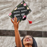 Never Give Up | Custom Class Year Graduation Cap Topper<br><div class="desc">Cute grad cap topper features the quote "never,  never,  never give up" in white brush script lettering on a black background adorned with pink watercolor flowers and green foliage. Personalize with your class year.</div>