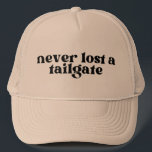 Never lost a tailgate trucker hat, football  trucker hat<br><div class="desc">The perfect Tucker hat for ball games,  football moms,  football fans,  tailgate fans and binge drinkers!</div>