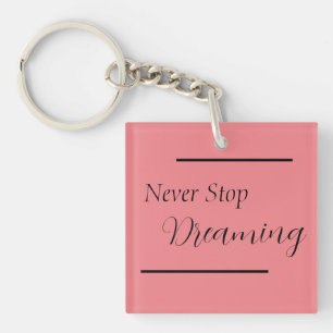 "Never Stop Dreaming" Phrase Black Lettering Keychain