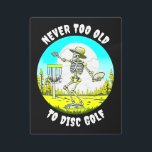 Never Too Old to Disc Golf | Skeleton Throwing Metal Print<br><div class="desc">Blue and green vintage retro vibe featuring a skeleton in a sunhat disc golfing in the woods with the quote,  'Never too old to disc golf."</div>