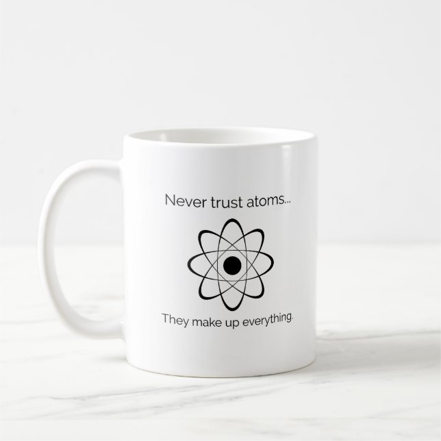 Never Trust Atoms. Funny Science Coffee Mug (Left)