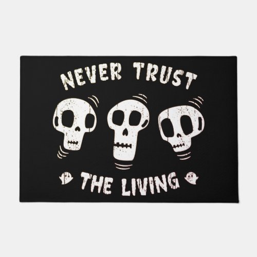 Never Trust The Living Wise Skulls Halloween Doormat