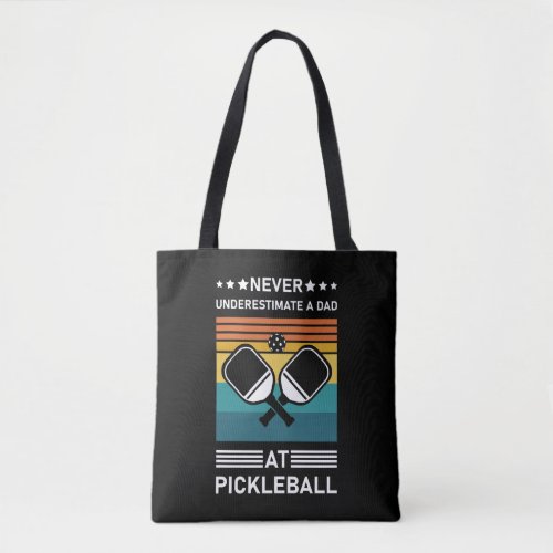 Never underestimate a Dad at Pickleball           Tote Bag