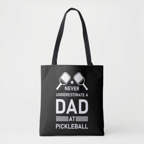Never underestimate a Dad at Pickleball   Tote Bag