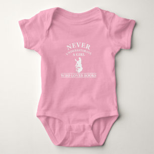 never underestimate a girl who loves books baby bodysuit