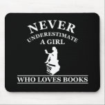 never underestimate a girl who loves books mouse pad<br><div class="desc">This original Never underestimate the power of a girl with a book graphic design with awesome typography font lettering is perfect for girls and women who are fans of reading books every day. It also can be given as a birthday or Christmas gift to your best friend, relative, mother, or...</div>