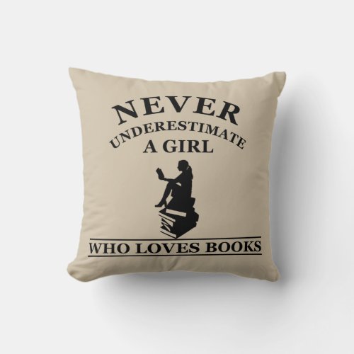 never underestimate a girl who loves books throw pillow