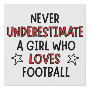 Never underestimate a girl who loves football. faux canvas print