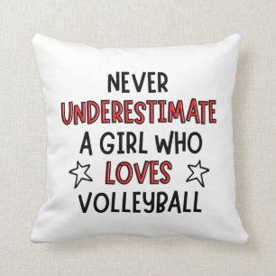 Never underestimate a girl who loves volleyball. throw pillow