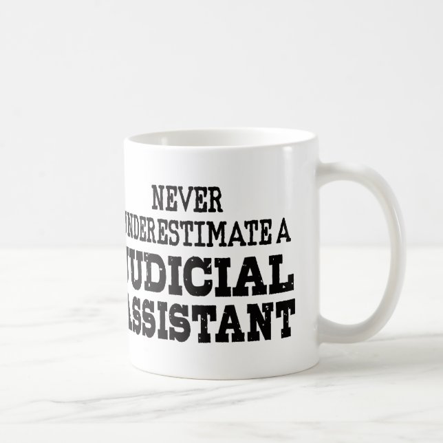 Never underestimate a Judicial assistant Coffee Mug (Right)