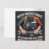 Never Underestimate a Man Still Turning Wrenches  (Front/Back)
