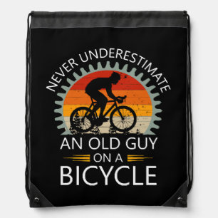 Never Underestimate An Old Guy On A Bicycle Drawstring Bag