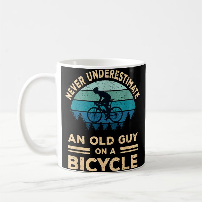 Never Underestimate An Old Guy On A Bicycle Funny  Coffee Mug (Left)