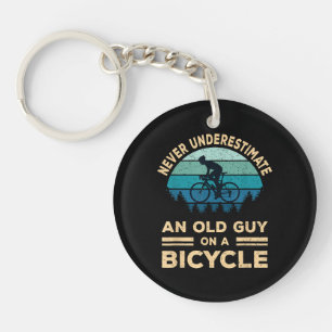 Never Underestimate An Old Guy On A Bicycle Funny Keychain