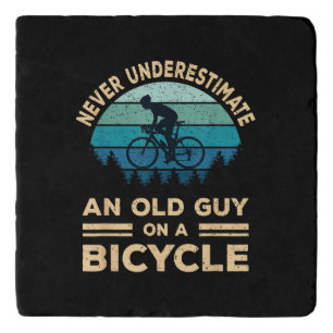 Never Underestimate An Old Guy On A Bicycle Funny Trivet