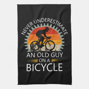 Never Underestimate An Old Guy On A Bicycle Kitchen Towel