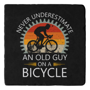 Never Underestimate An Old Guy On A Bicycle Trivet