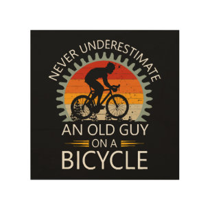 Never Underestimate An Old Guy On A Bicycle Wood Wall Art