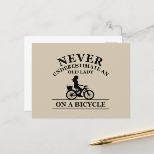 Never underestimate an old lady on a bicycle holiday postcard