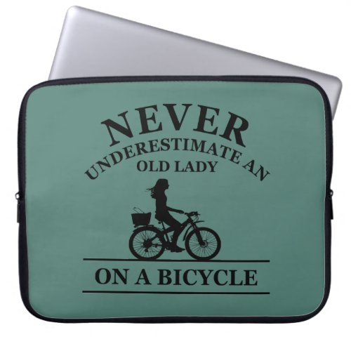 Never underestimate an old lady on a bicycle  laptop sleeve