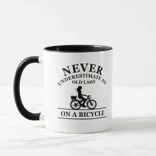 Never underestimate an old lady on a bicycle mug