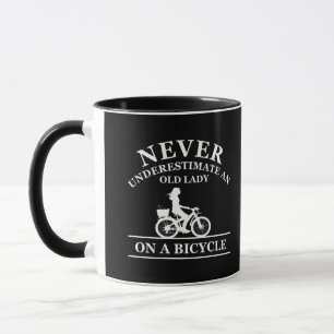Never underestimate an old lady on a bicycle mug