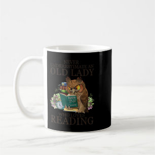Never Underestimate An Old Lady Who Loves Reading Coffee Mug