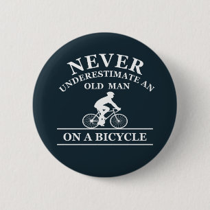 never underestimate an old man on a bicycle button