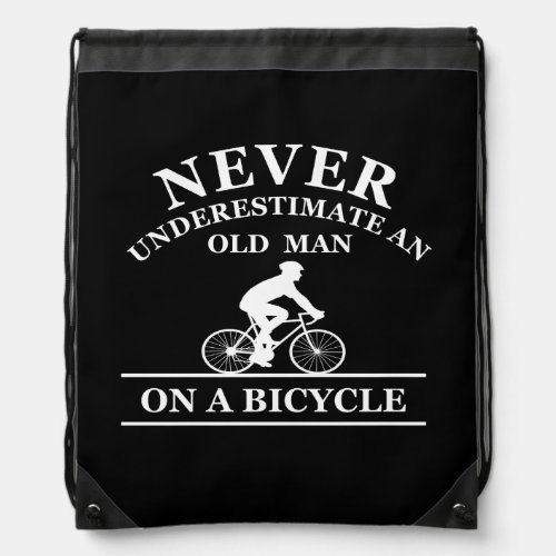 never underestimate an old man on a bicycle  drawstring bag