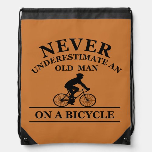 never underestimate an old man on a bicycle  drawstring bag