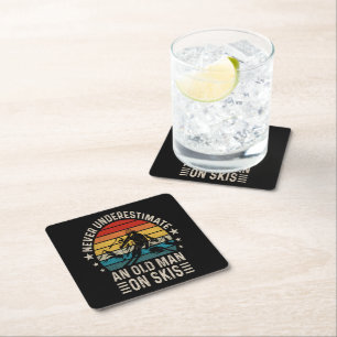 Never Underestimate An Old Man On Skis Retro Square Paper Coaster
