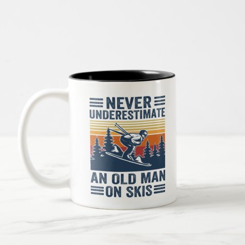 never underestimate an old man on skis Two_Tone coffee mug
